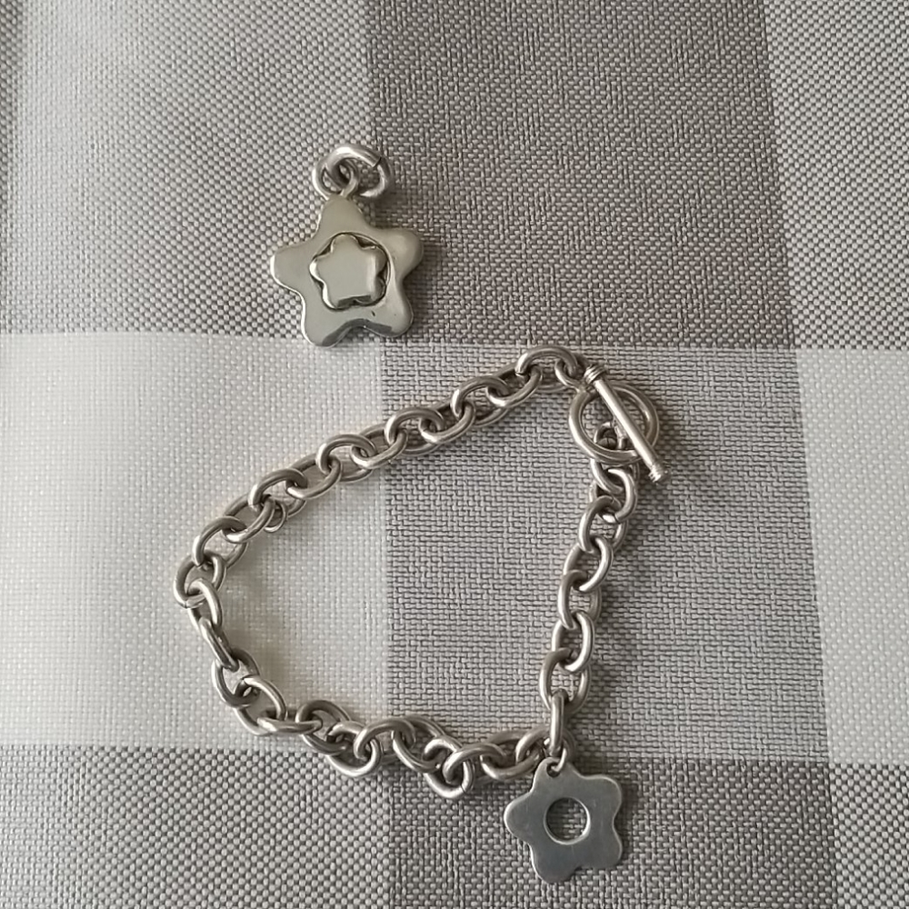 Silver charm with silver bracelet